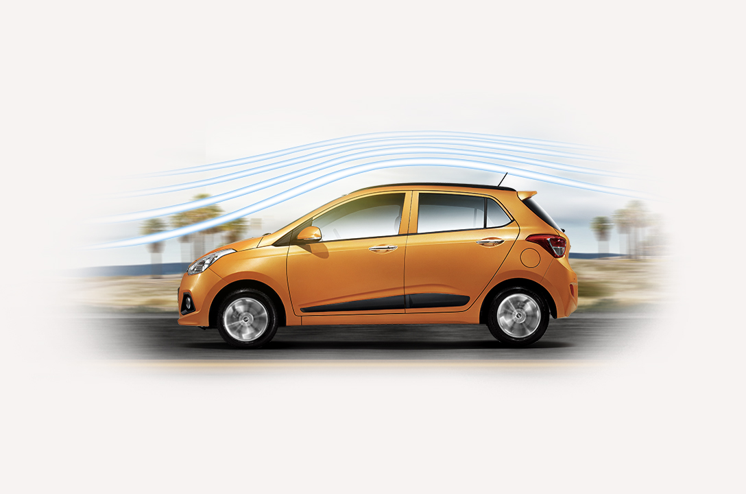 Aerodynamic graphic around the exterior of tangerine orange Grand i10