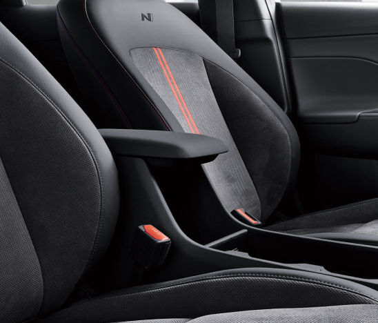 The center armrest provides additional comfort and support for the driver and passengers.