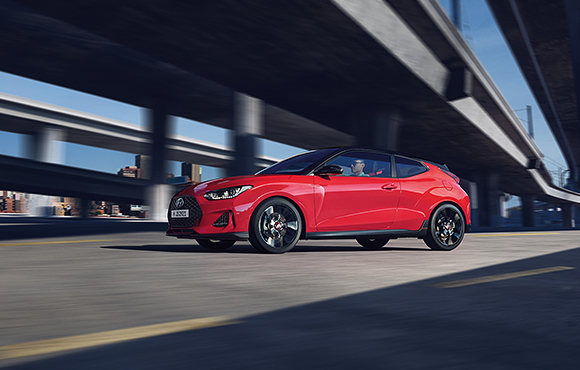 Top view of red veloster with open the door