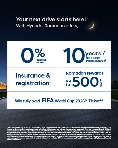 Blue Sonata is placed in front of a building with white color