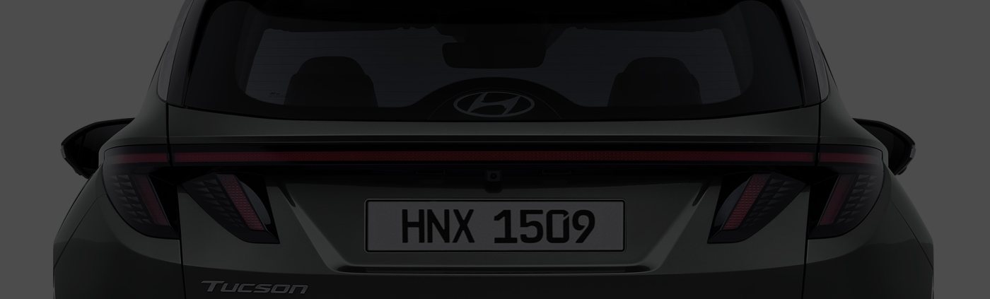 Closer view at the front part of Hyundai car with its logo and grille